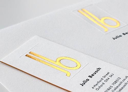 a close up of a julia beusch business card