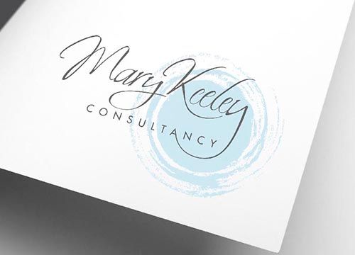 a close up of a logo for mary keeley consultancy on a piece of paper .