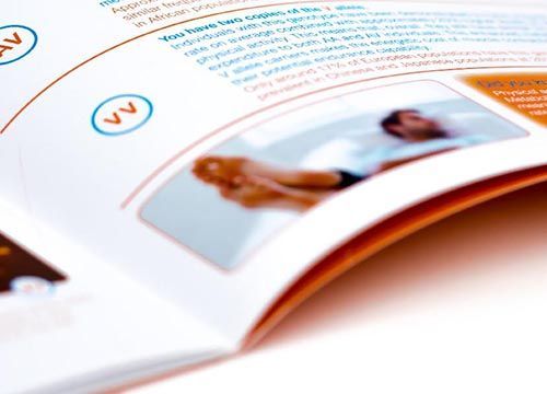 a close up of a book with a picture of a man laying on a bed .