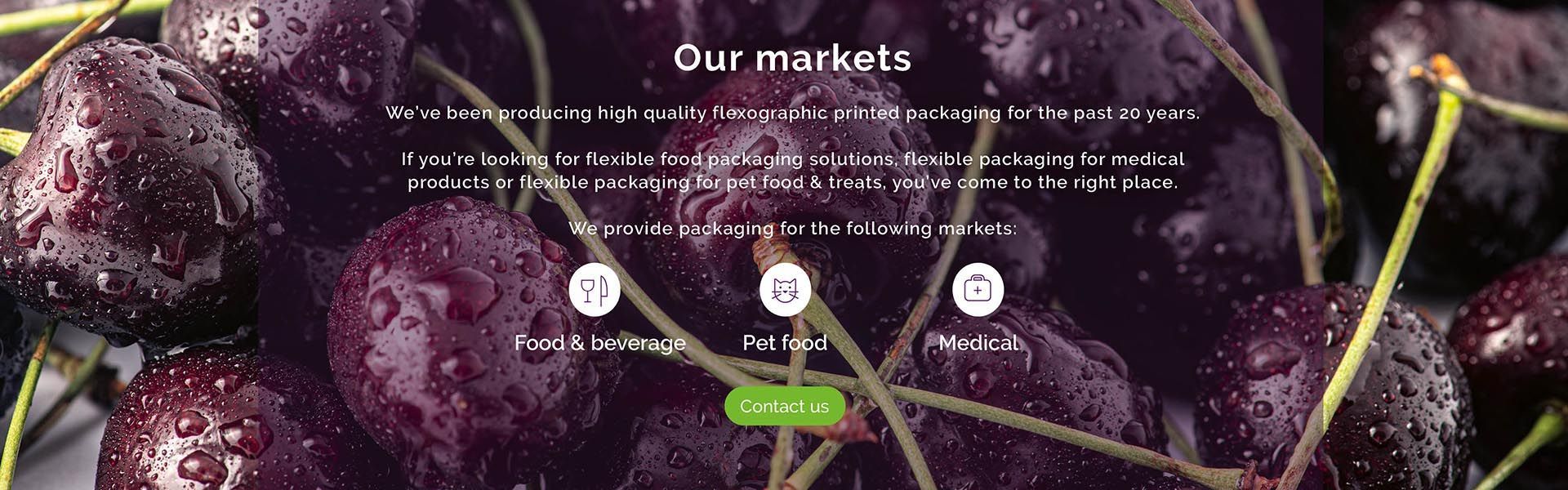 an advertisement for our markets shows a great picture of a ripe bunch of cherries