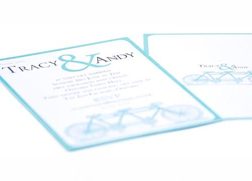 a wedding invitation for tracy and andy with a tandem bicycle on it