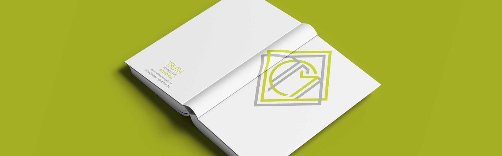 a book is open to a page that shows the truth marketing and coaching logo