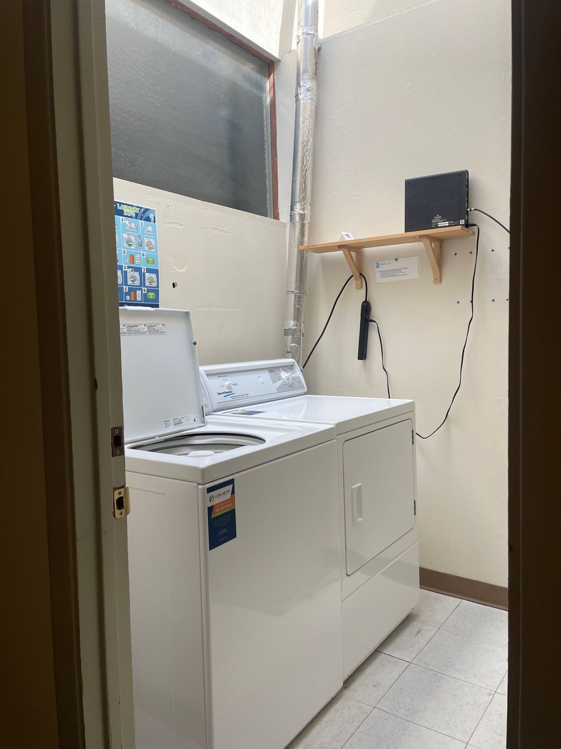 There is a washer and dryer in the laundry room.