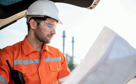 Civil Engineer Reading Blue Print - Long Lake, MN -  Gronberg & Associates, Inc.