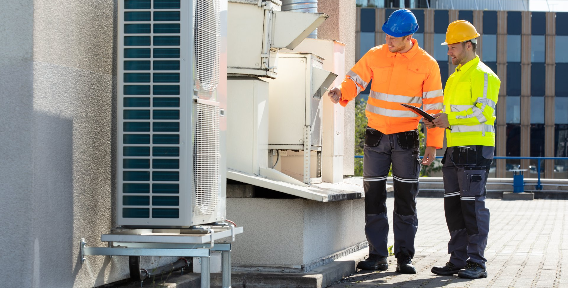 2 men working on commercial hvac services and repair in DeKalb