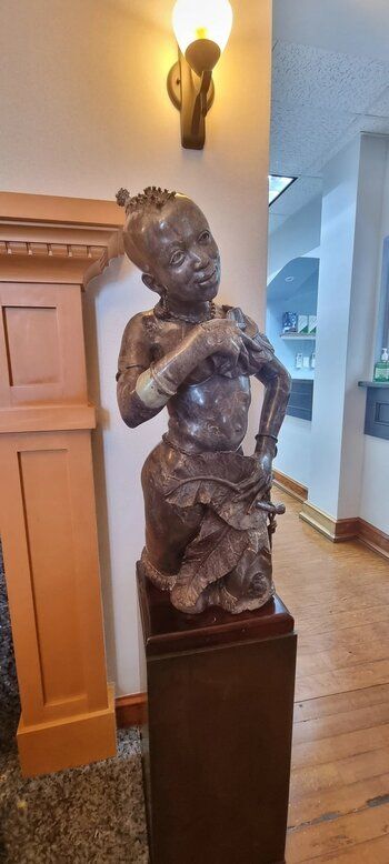 A statue is show inside Paget Dental Group