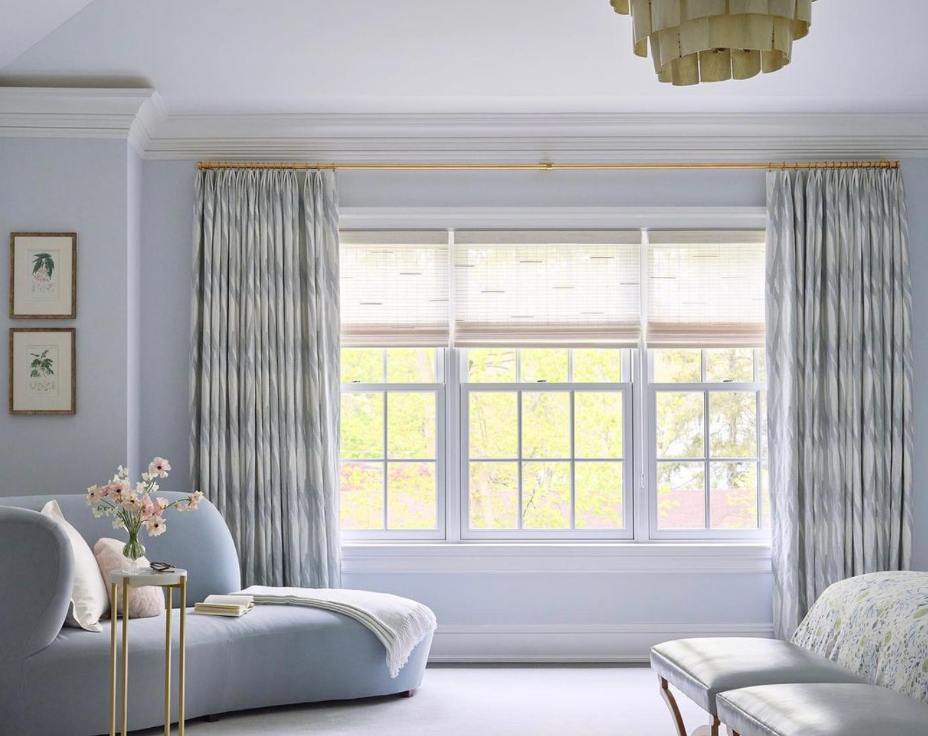 Hunter Douglas Alustra® Woven Textures® Roller Shades in a bay window 
