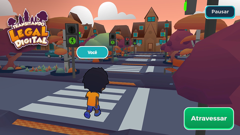Um menino está andando na faixa de pedestres jogando videogame.