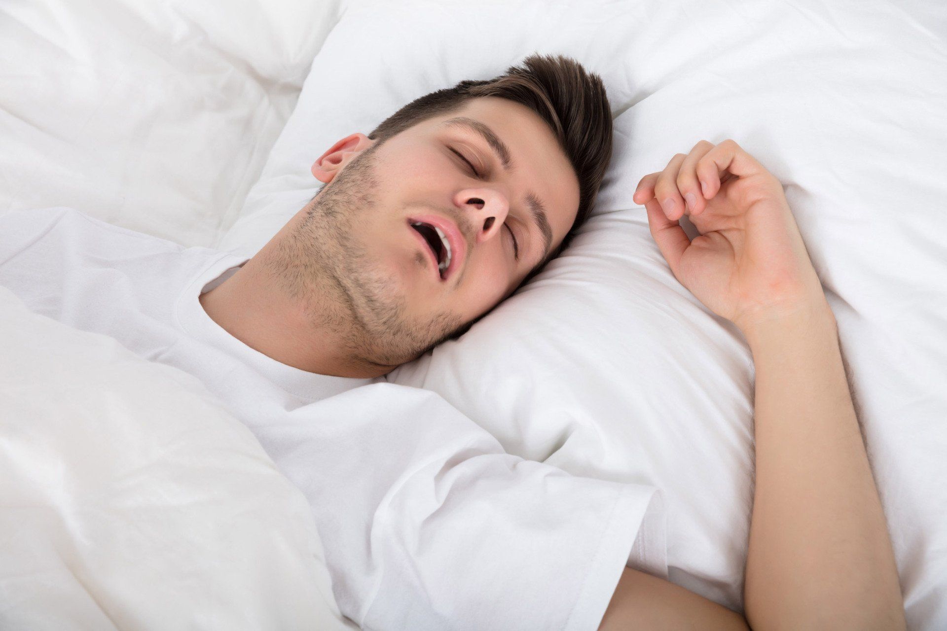 Man Snoring — Rochester Hills, MI — The Elite Smile Center