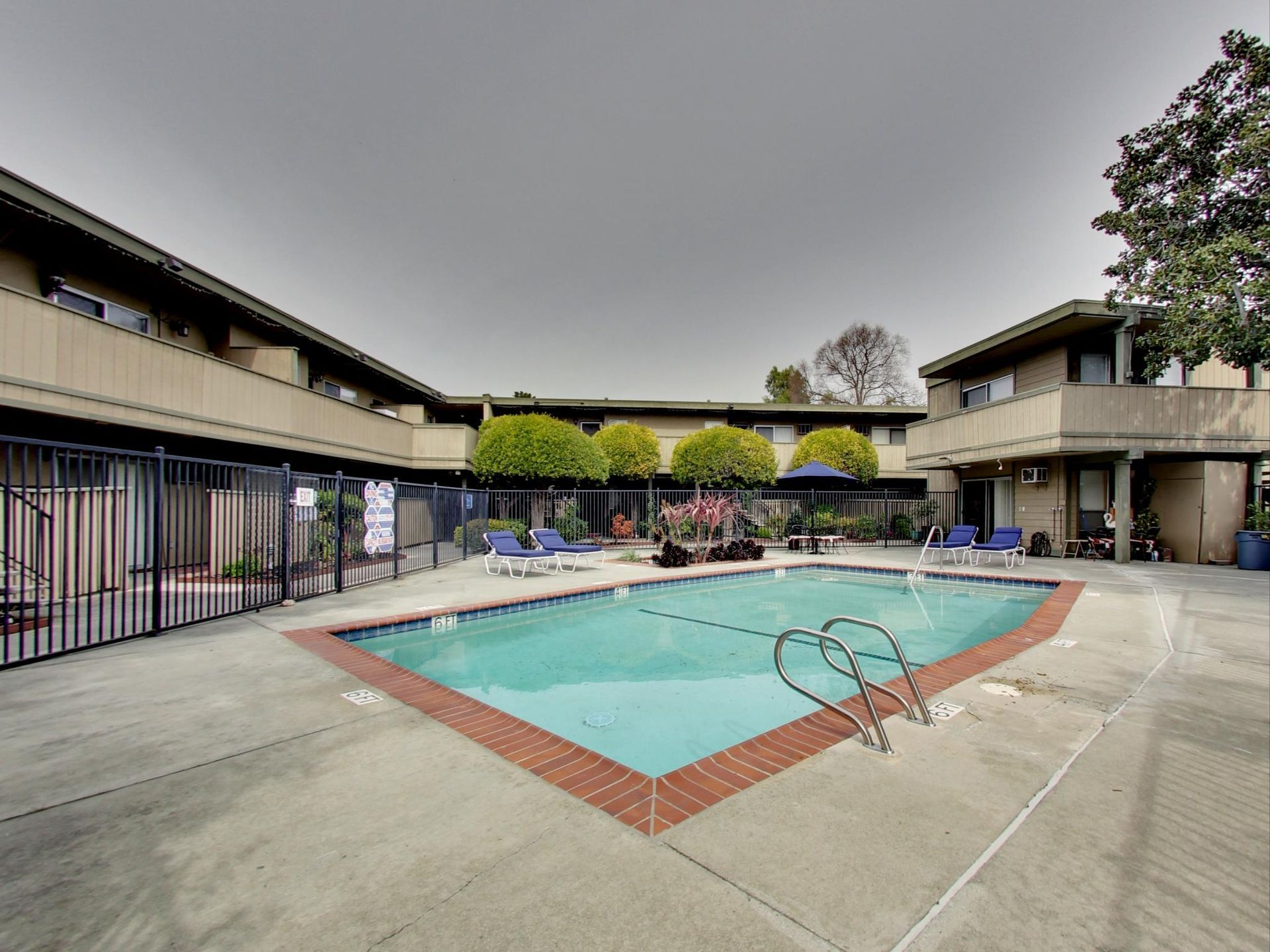 exterior photo of swimming pool and spa