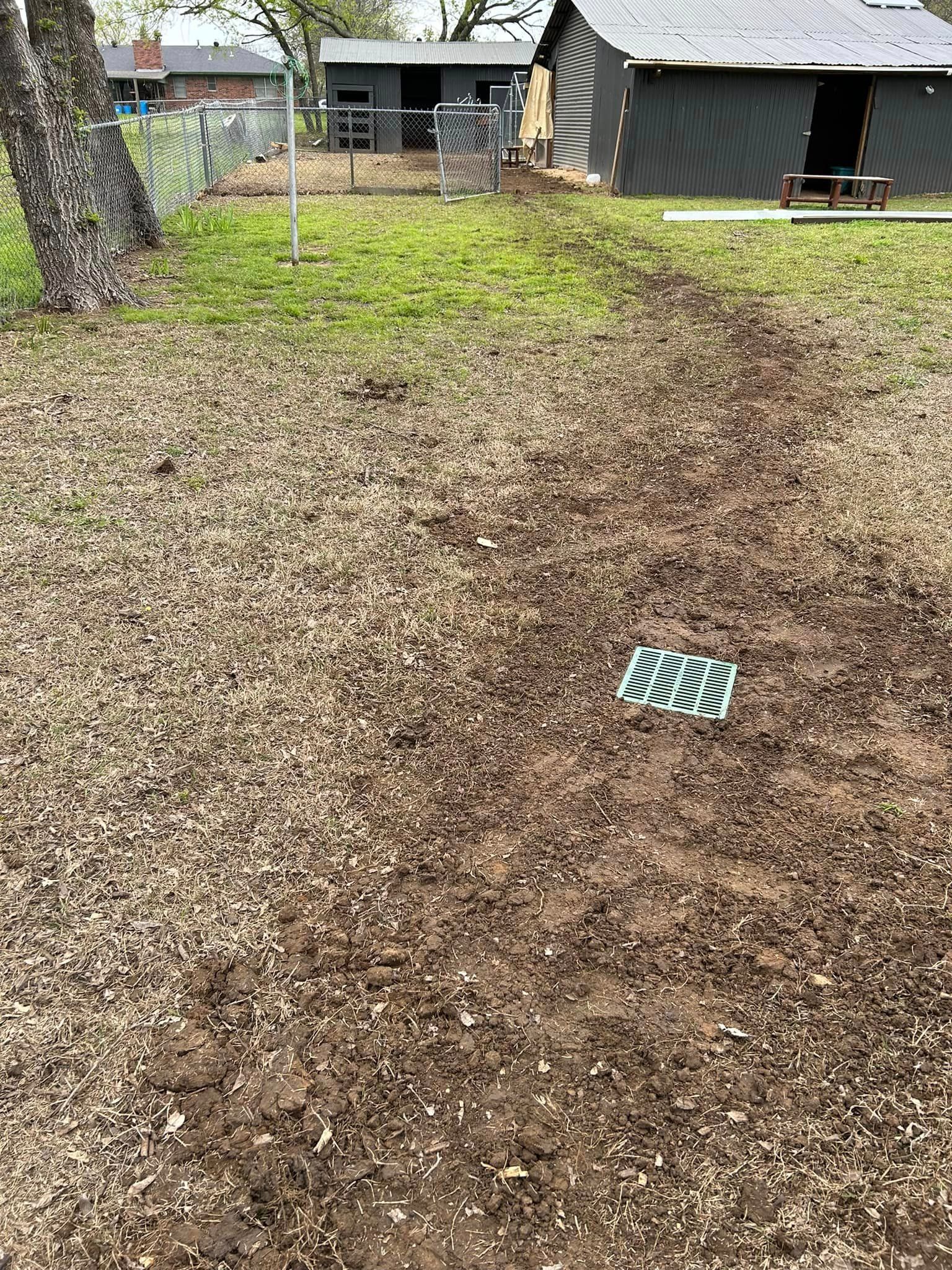 There Is a Drain in The Middle of The Dirt in The Backyard - Collinsville, TX - L5 Irrigation