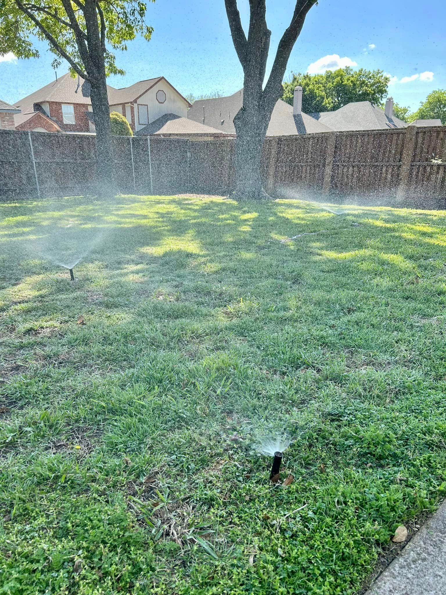 A Sprinkler Is Spraying Water on A Lush Green Lawn - Collinsville, TX - L5 Irrigation