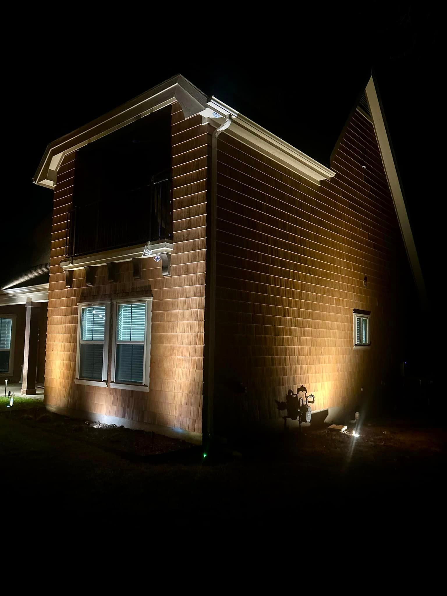 A Brick House Is Lit up At Night - Collinsville, TX - L5 Irrigation