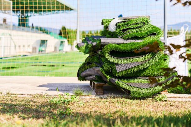 Front view of a pile of artificial turf of a soccer field on a path - Collinsville, TX - L5 Irrigation