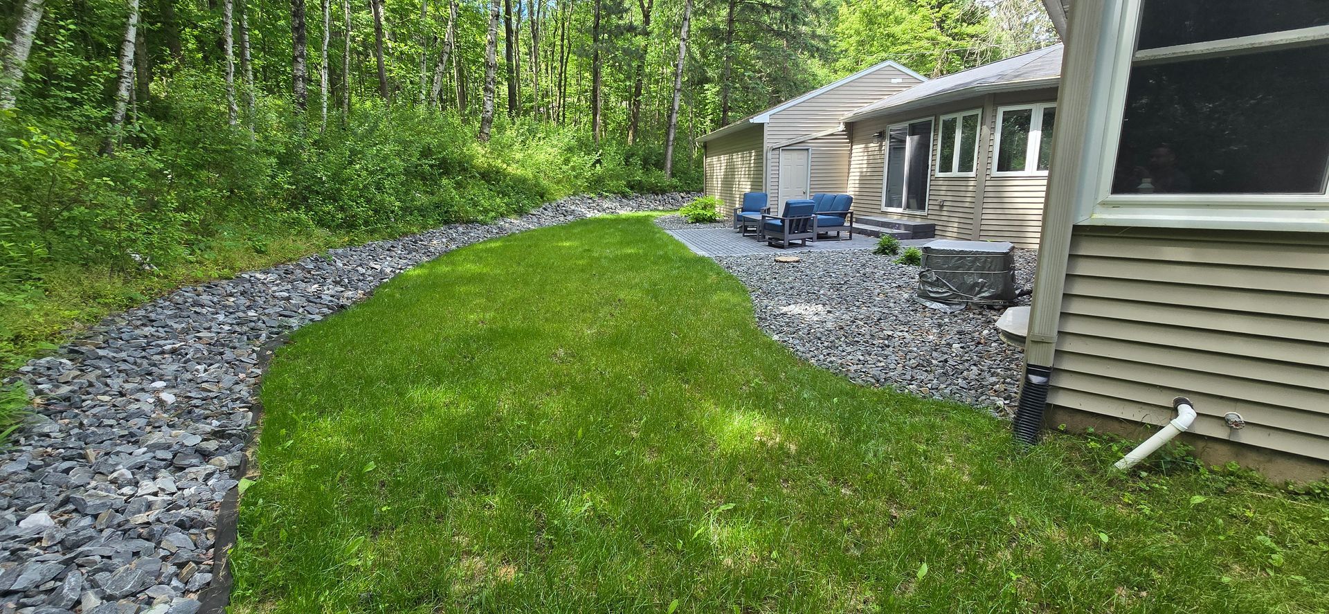 Finished backyard drainage system and permeable patio near Franklin in Wausau WI