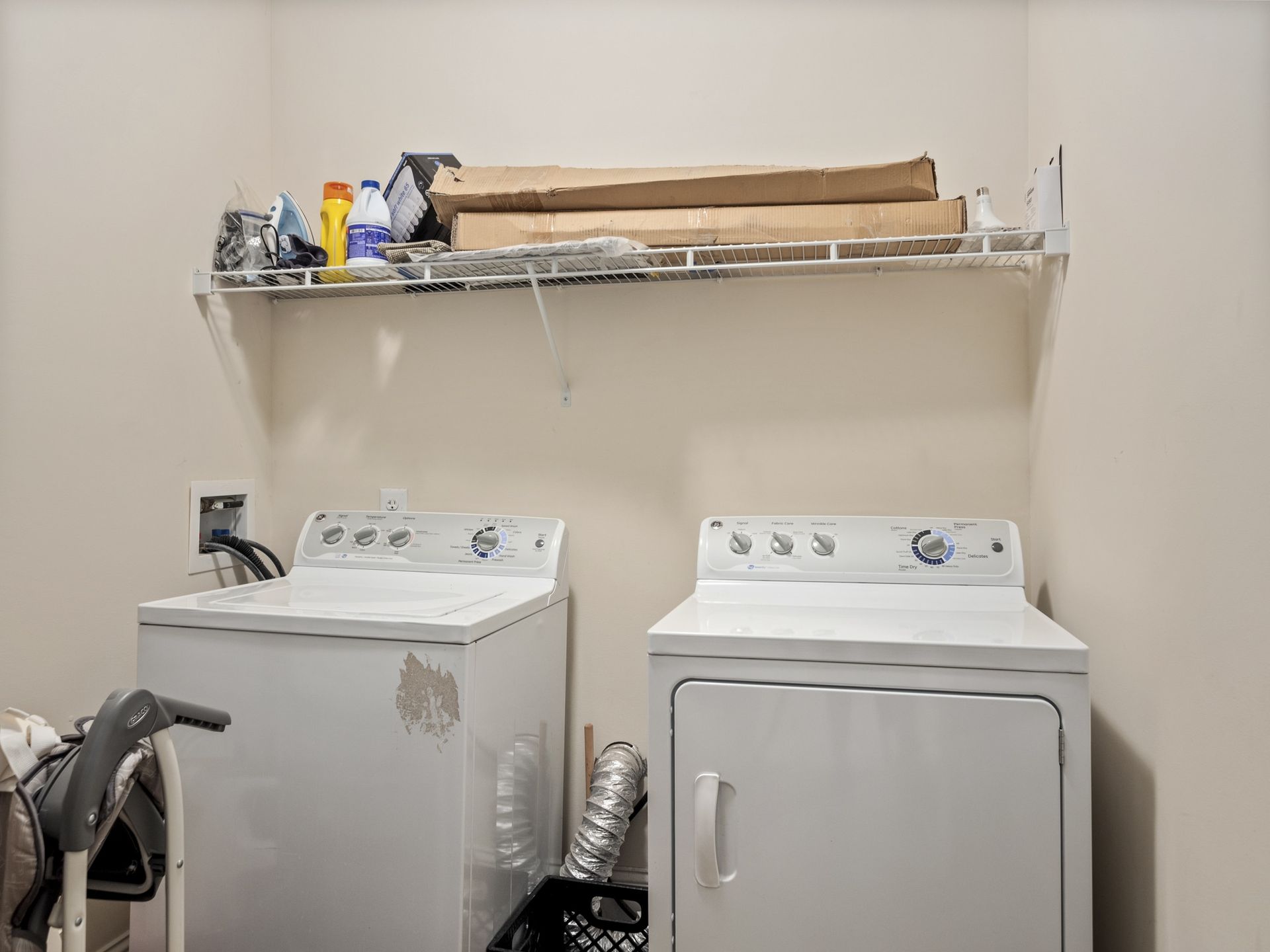 There is a washer and dryer in the laundry room.