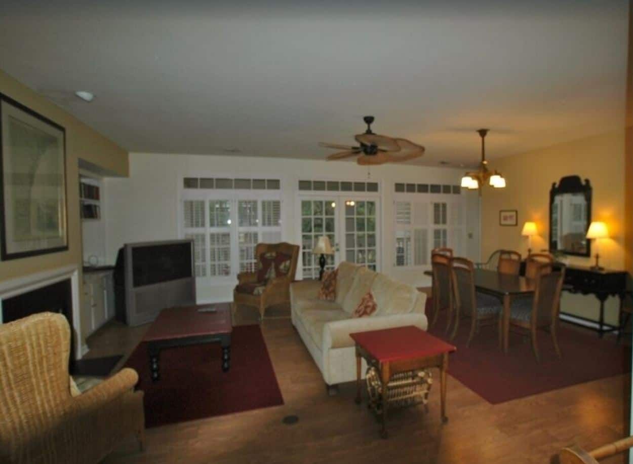 A living room filled with furniture and a fireplace