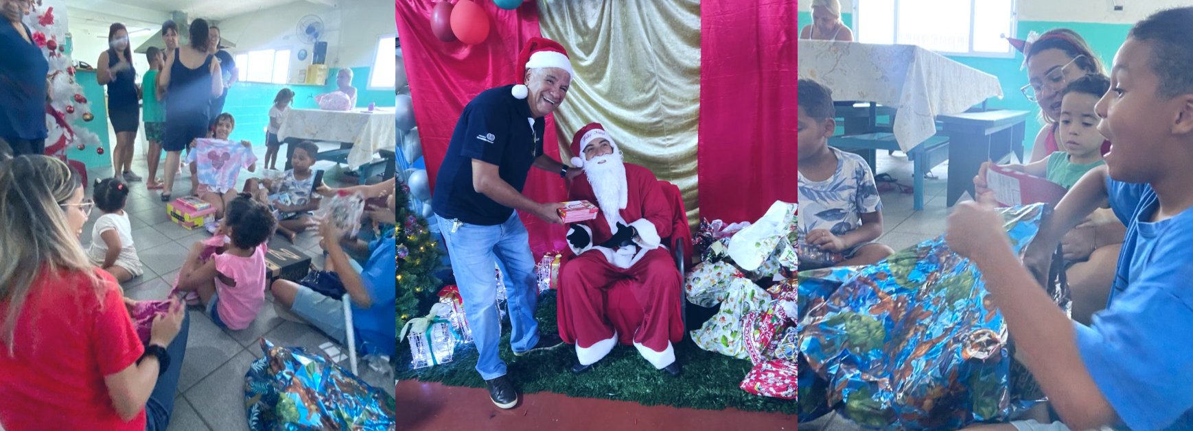 Um grupo de pessoas se reúne em volta de um homem vestido de papai noel