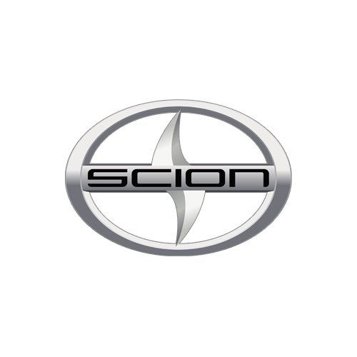 Silver Scion car logo with oval emblem and stylized star emblem on white background