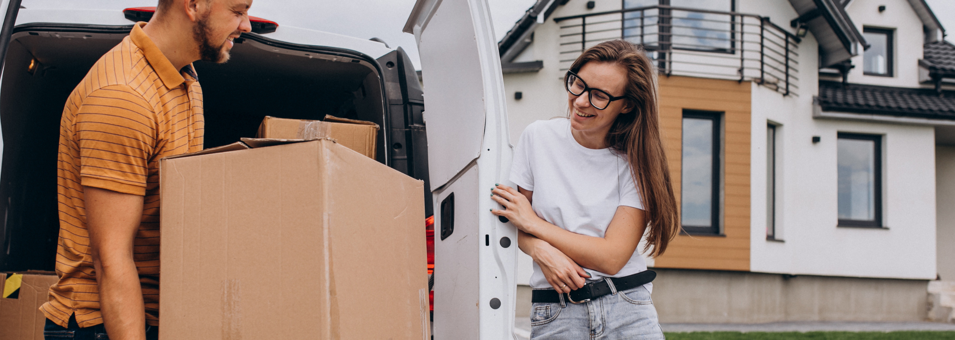 Picture of a van being packed with boxes for a house move. Picture of a van being packed with boxes for a house move.