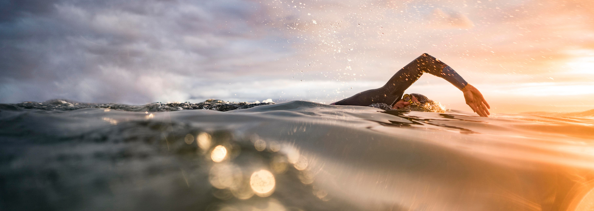 Picture of a person swimming in the sea.