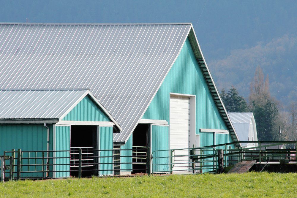 Teal pole barn