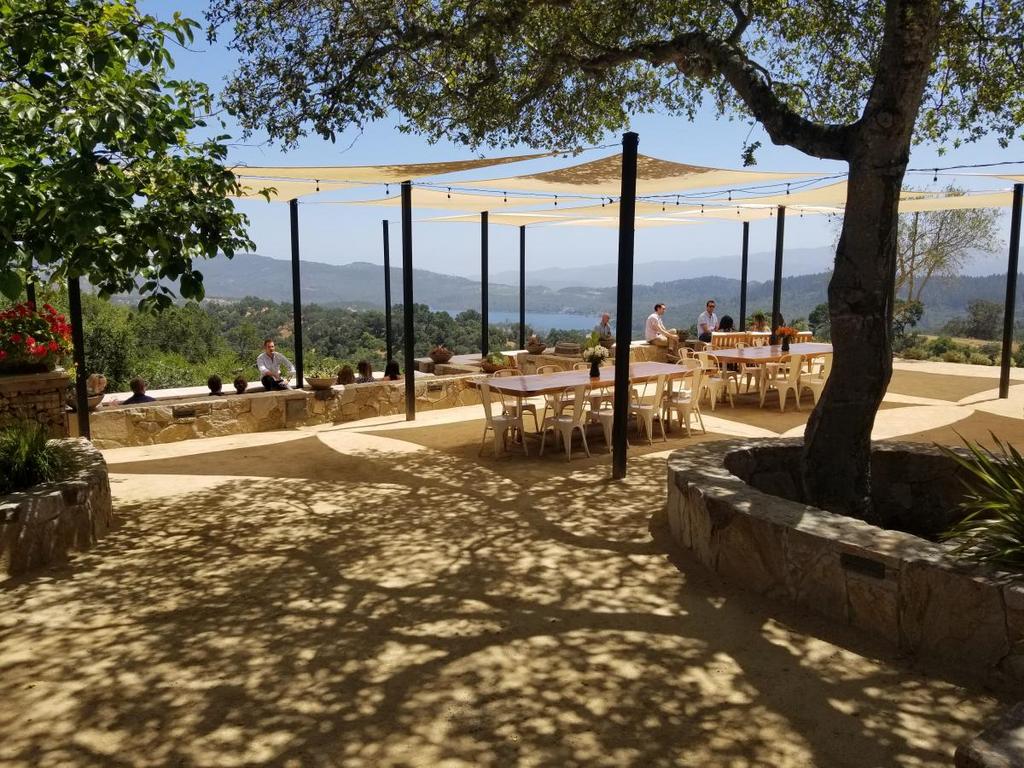 outside seating that is covered with a canopy