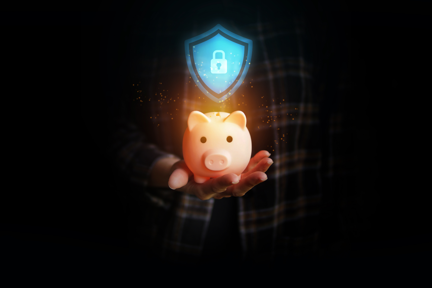 Man Holding a Piggy Bank