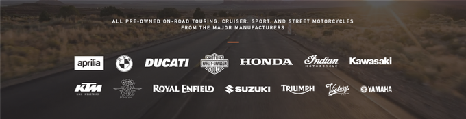 Row of white sponsor logos over a blurred brown outdoor background banner.