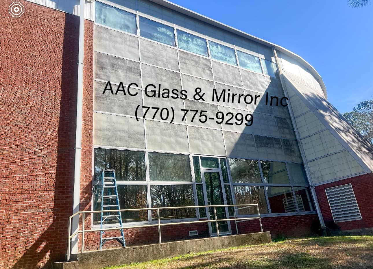 A Building Installing A New Glass Window — Jenkinsburg, GA — AAC Glass