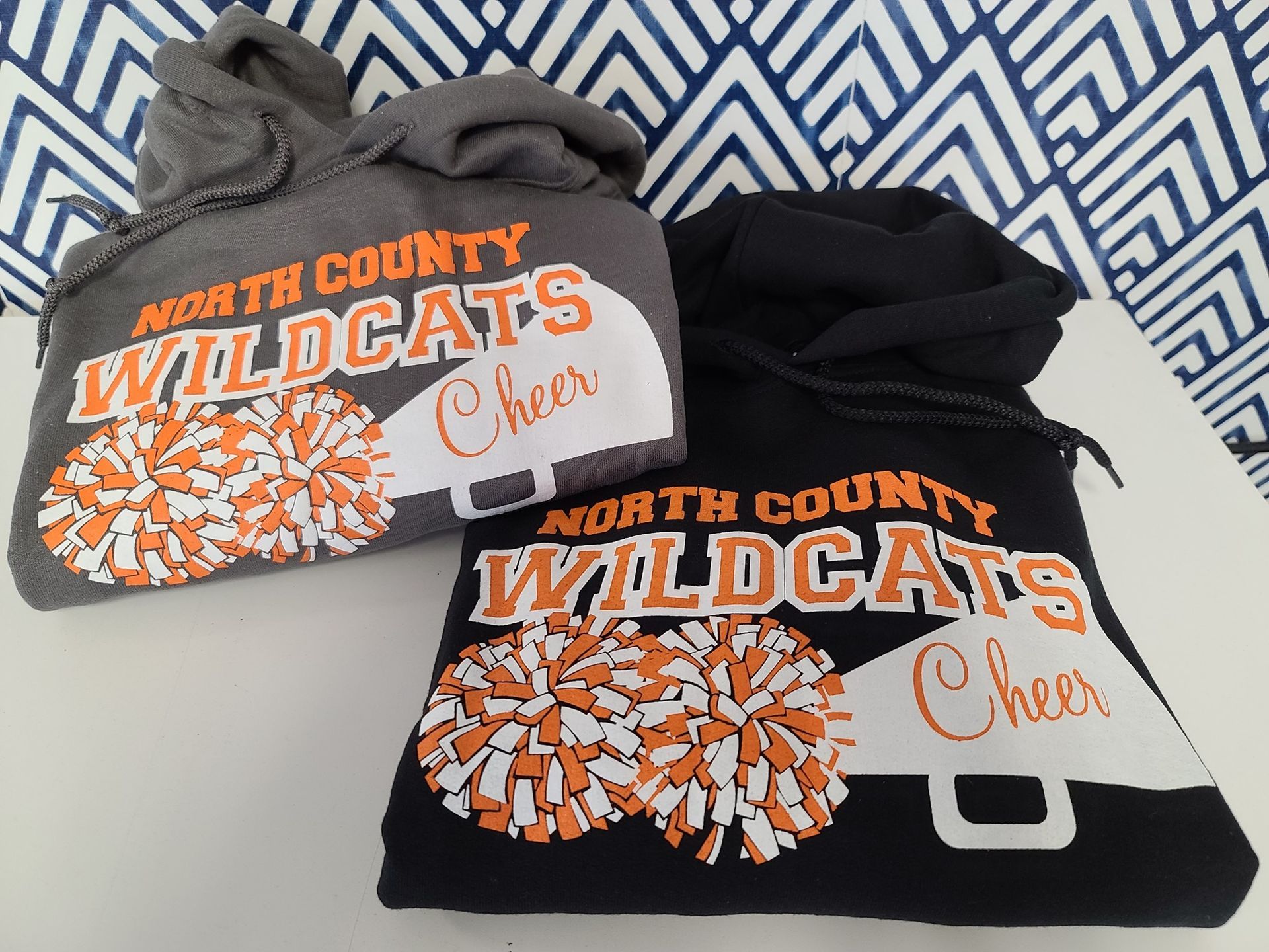 Two sweatshirts with
