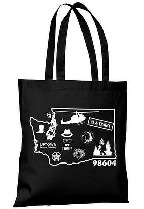 A blue bag that says uptown screen printing on it