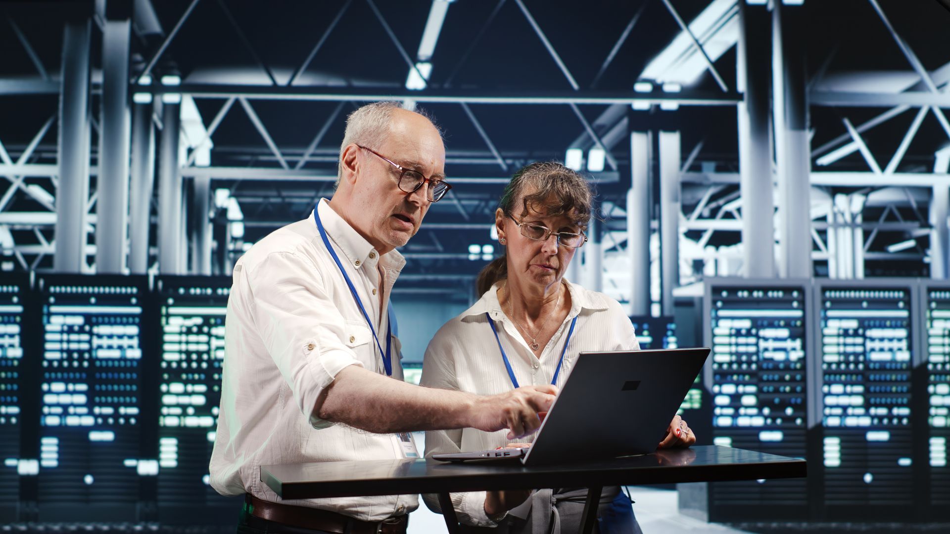 Data centre commissioning engineers testing critical electrical systems