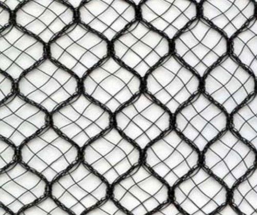 Black chain-link fence pattern against a light background