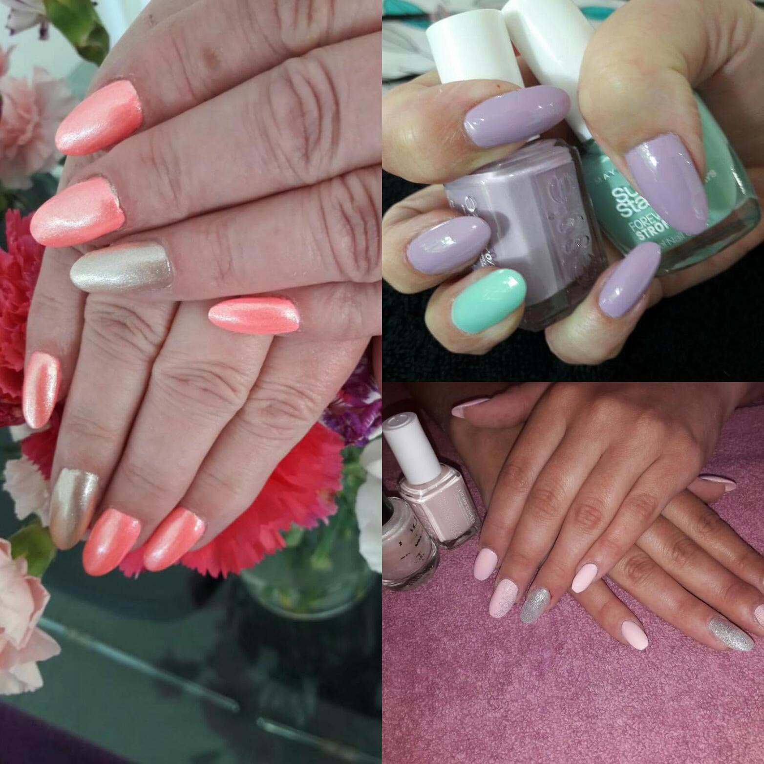 hands with multicoloured fingernails