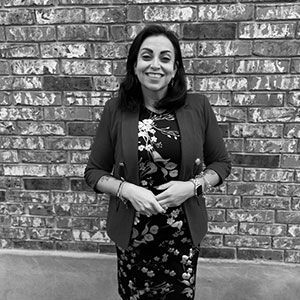 Black and white photo of Blanca Vela, staff member at Infintie Potential