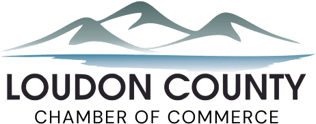 Logo for Loudon County Chamber of Commerce: mountains above water, text below 