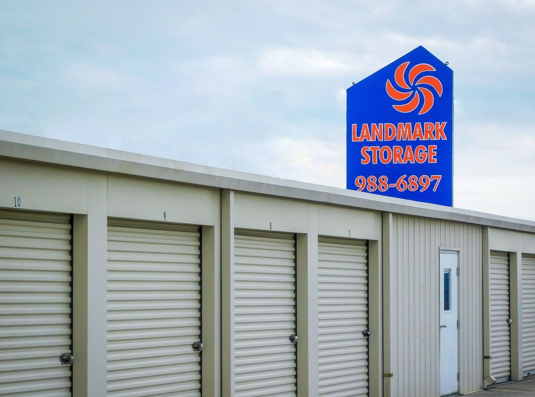 Storage units with a Landmark Storage sign above.