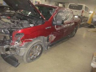 Damaged Red Truck | Faribault, MN | Midwest Collision