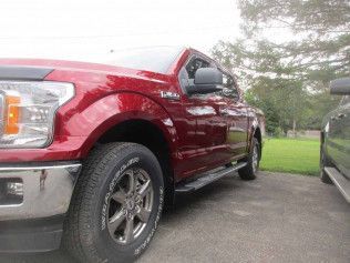 Damaged Red Truck After Repair | Faribault, MN | Midwest Collision