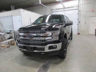 A Broken Black Truck After Repair | Faribault, MN | Midwest Collision