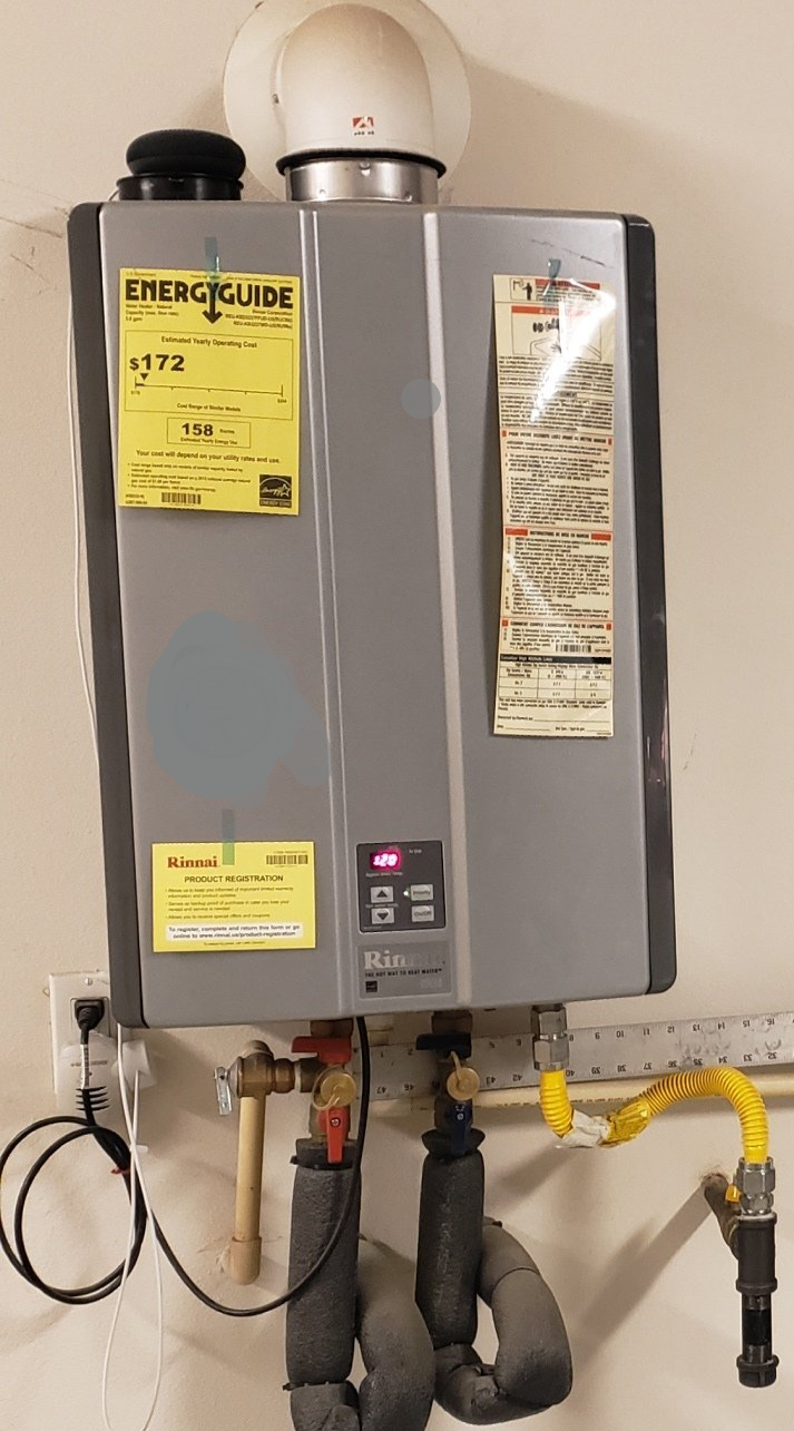 Plumber Checking The Water Heater — San Diego, CA — Level Up Plumbing Plumber Checking The Water Heater — San Diego, CA — Level Up Plumbing