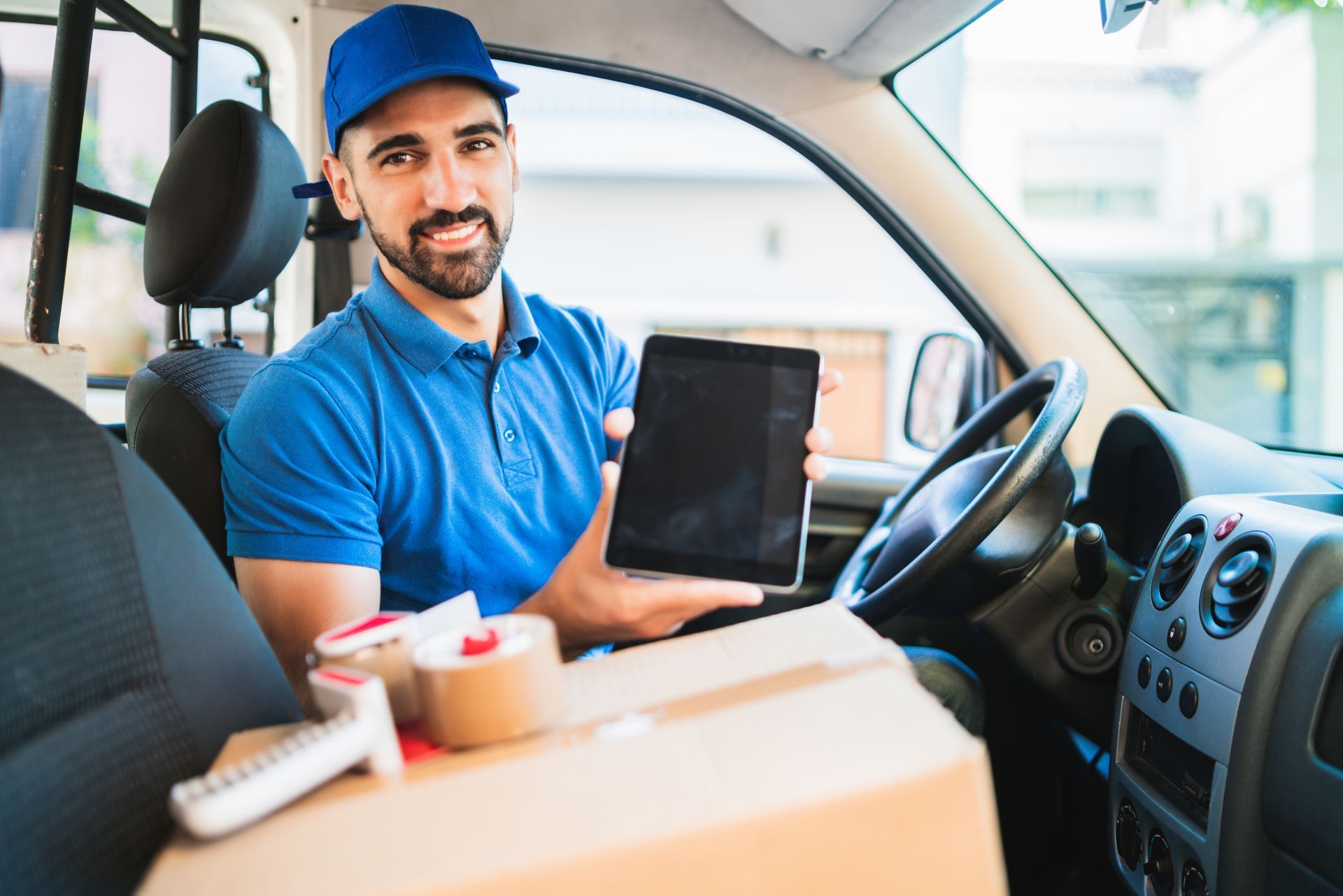 New delivery driver following safety guidelines while using scanner technology
