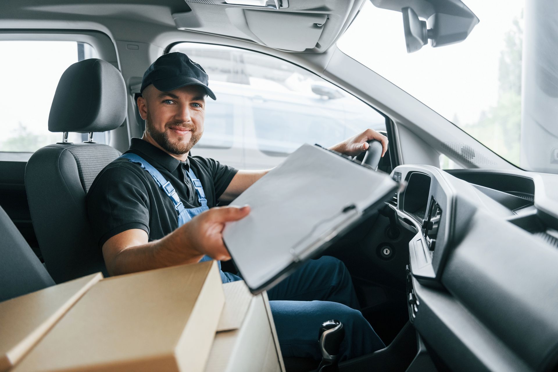 amazon delivery driver with clipboard 