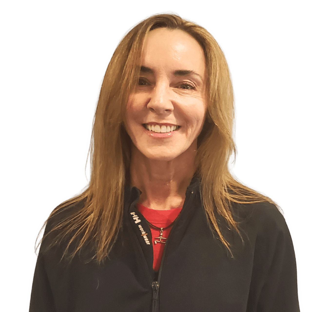Smiling person in a black jacket and red shirt against a white background