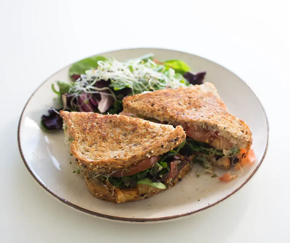 Vegetarian sandwich with red pepper dip