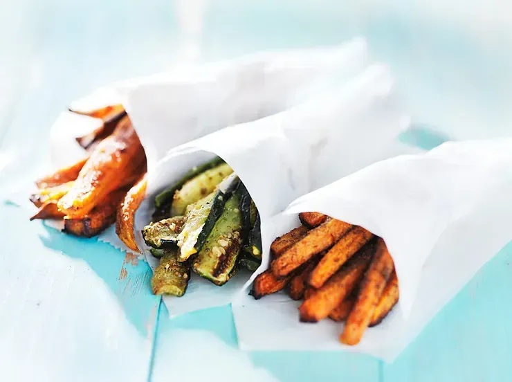 Various snacks wrapped up in parchment paper