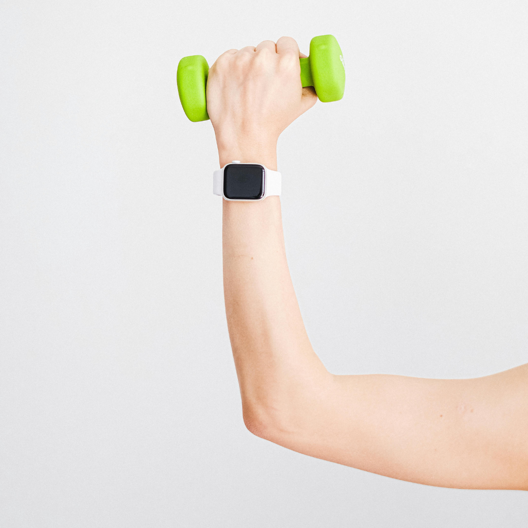 arm holding weight with smart watch