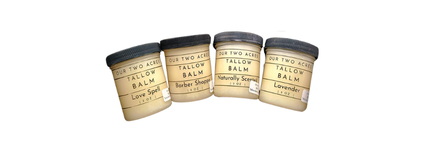 A showcase of Our Two Acres Tallow Balm vials