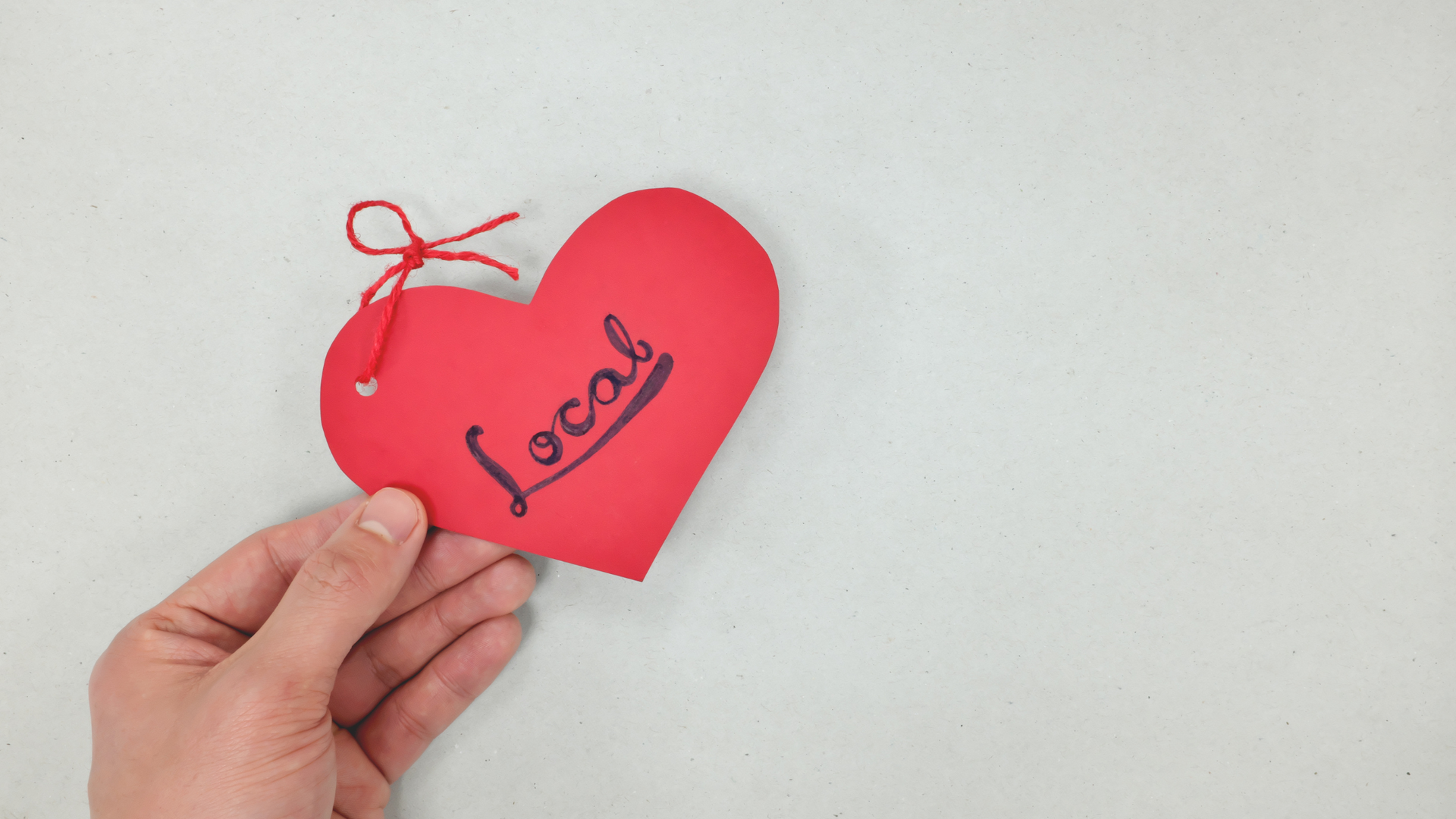 A paper-mache heart that says 